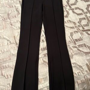 Elie Tahari Black Flare Pants New. Zipper hem. Beautiful stretch material.